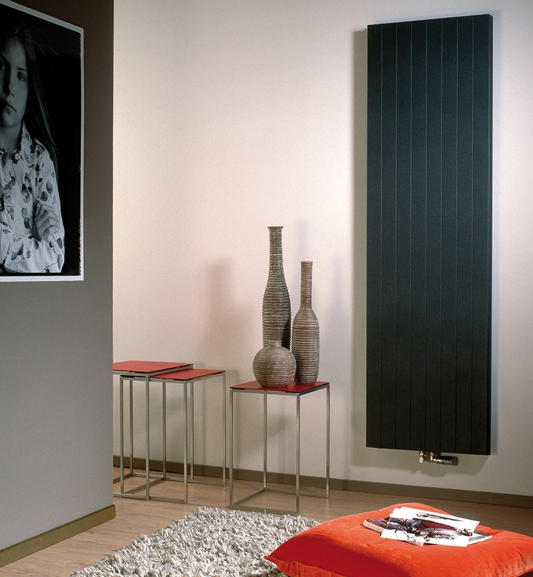 Purmos radiatorer i moderne hjemmeindretning. Passer fortrinligt , når du renoverer dit hverdagsrum